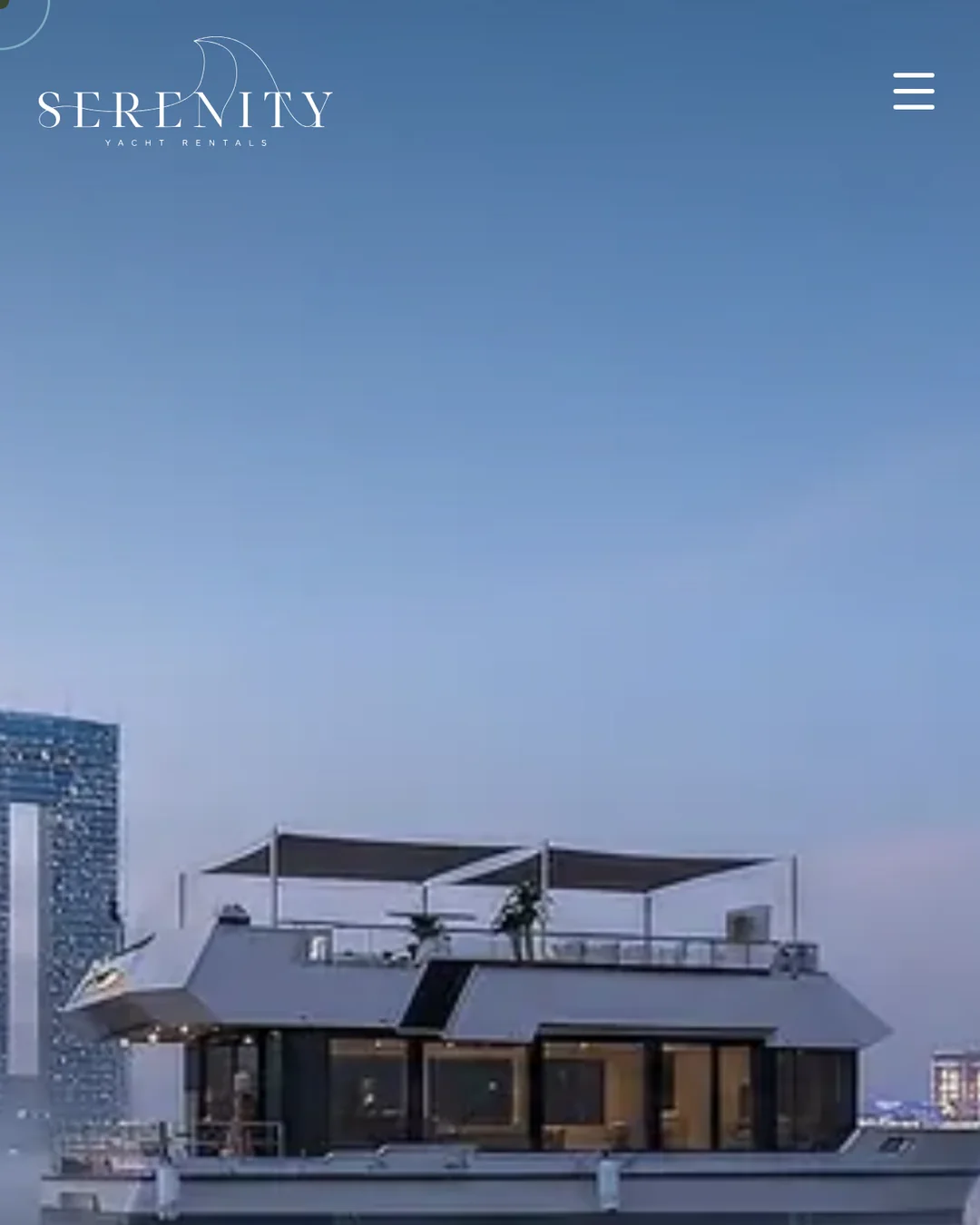 The Serenity website homepage on a phone, the yacht at Dubai Harbour at dawn